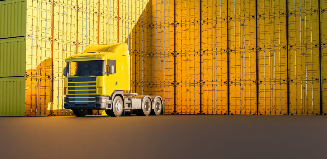 yellow truck with many stacks of containers